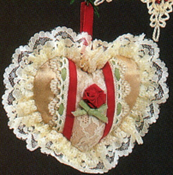 Aunt Krismas 'Lacy Heart' ornament by Hallmark. Year: 1985 - N/A series #0. 'Damaged Box' condition.