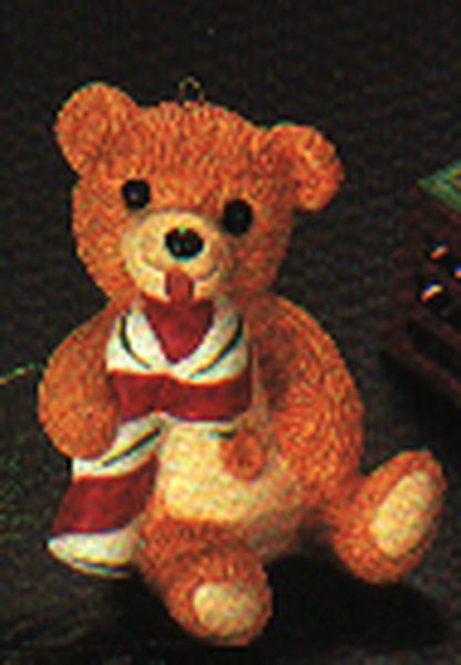 Aunt Krismas 'Cinnamon with Candy Cane' ornament by Peter Dutkin. Year: 1985 - Porcelain Bear series #3. 'Mint In Box' condition.