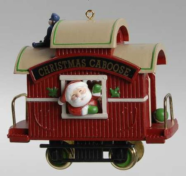 Aunt Krismas 'Christmas Caboose' ornament by Ken Crow. Year: 1989 - Here Comes Santa series #11. 'Mint In Box' condition.