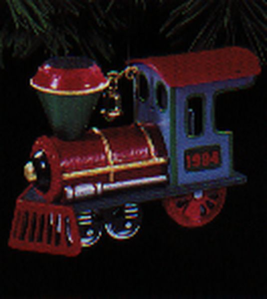 Aunt Krismas 'Locomotive' ornament by Linda Sickman. Year: 1994 - Yuletide Central series #1. 'Mint In Box' condition.