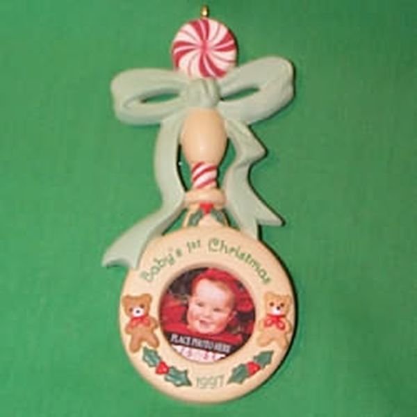 Aunt Krismas 'Baby's First Christmas - Photo Holder' ornament by Hallmark. Year: 1997 - N/A series #0. 'No Box' condition.