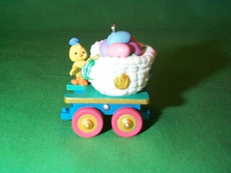 Aunt Krismas 'Colorful Coal Car' ornament by Ken Crow. Year: 1997 - Cottontail Express series #2. 'Mint In Box' condition.