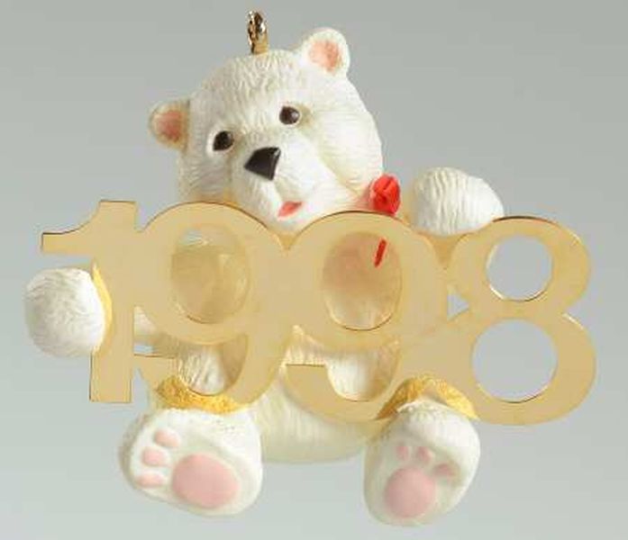 Aunt Krismas 'Polar Bear with Brass 1998' ornament by Sharon Pike. Year: 1998 - Fabulous Decade series #9. 'Mint In Box' condition.