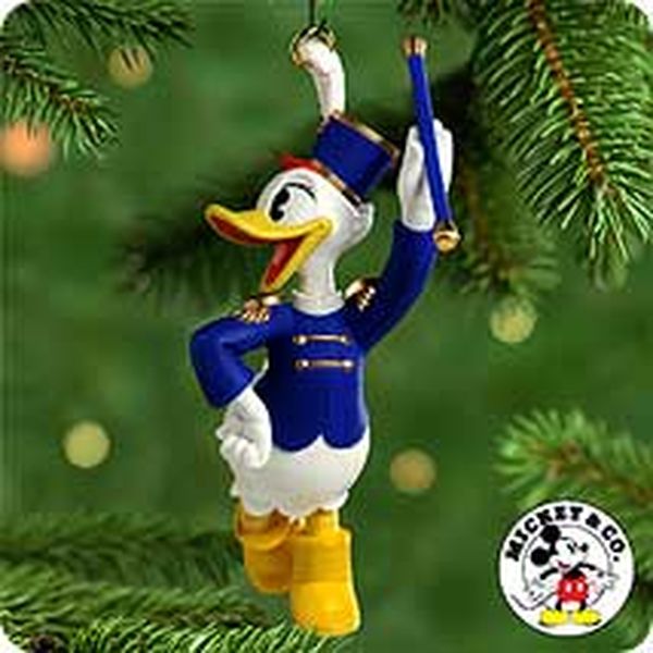 Aunt Krismas 'Baton Twirler Daisy' ornament by Hallmark. Year: 2000 - Mickey's Holiday Parade series #4. 'Mint In Box' condition.