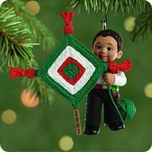 Aunt Krismas 'Feliz Navidad Eye of God' ornament by Julie Forsyth. Year: 2001 - Feliz Navidad  series #0. 'Mint In Box' condition.