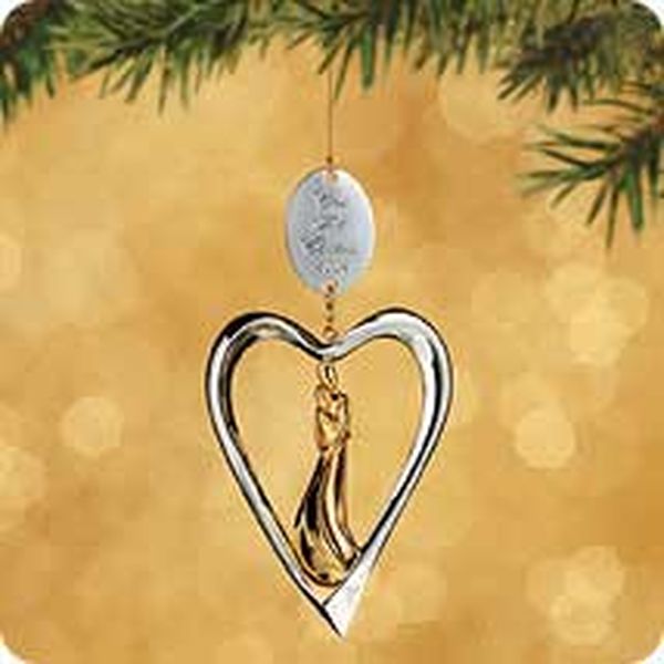 Aunt Krismas 'Our First Christmas (Silver Heart)' ornament by Patricia Andrews. Year: 2002 - N/A series #0. 'Mint In Box' condition.