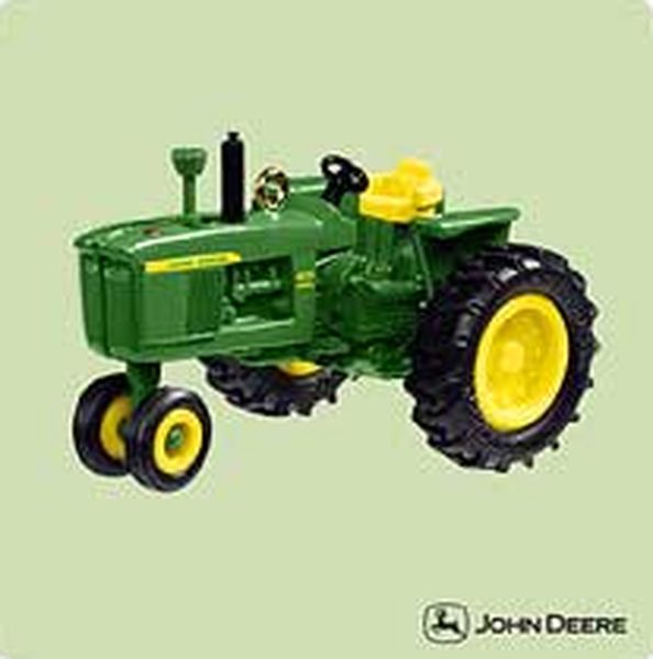 Aunt Krismas 'Model 4010 Tractor' ornament by Hallmark. Year: 2004 - John Deere series #0. 'Mint In Box' condition.