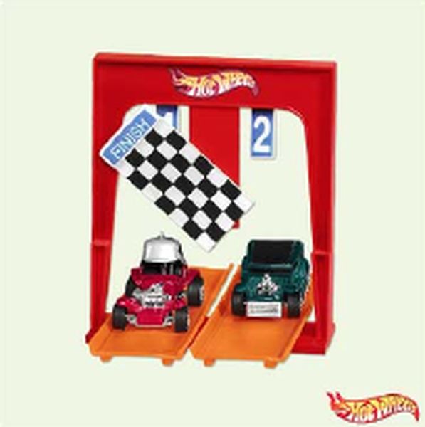 Aunt Krismas 'And the Winner Is…' ornament by Hallmark. Year: 2005 - Hot Wheels series #0. 'Mint In Box' condition.