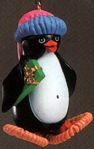 Aunt Krismas 'Snowshoe Penguin' ornament by Linda Sickman. Year: 1984 - N/A series #0. 'Slightly Damaged Box' condition.