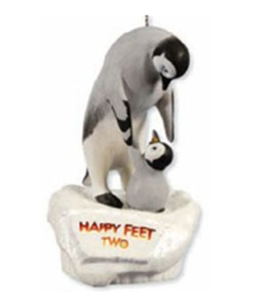 Aunt Krismas 'Happy Heroes Happy Feet Two' ornament by Tammy Haddix. Year: 2011 - N/A series #0. 'Mint In Box' condition.