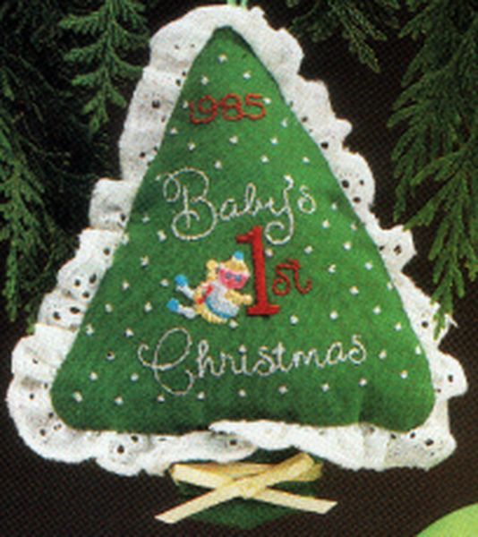 Aunt Krismas 'Baby's First Christmas' ornament by LaDene Votruba. Year: 1985 - N/A series #0. 'No Price Tag' condition.