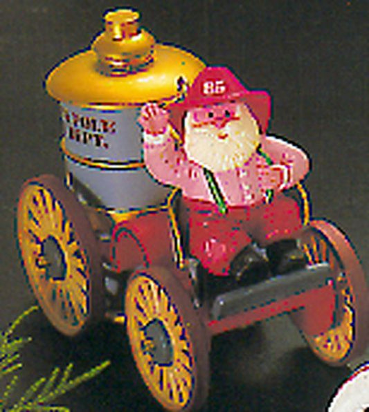 Aunt Krismas 'Santa’s Fire Engine' ornament by Linda Sickman. Year: 1985 - Here Comes Santa series #7. 'Mint In Box' condition.
