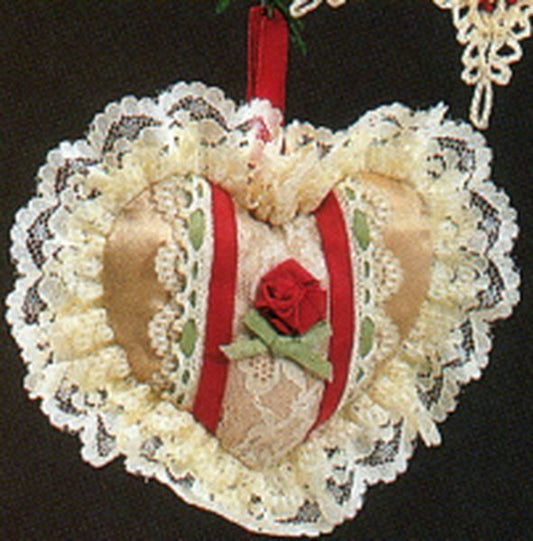 Aunt Krismas 'Lacy Heart' ornament by Hallmark. Year: 1985 - N/A series #0. 'Damaged Box' condition.