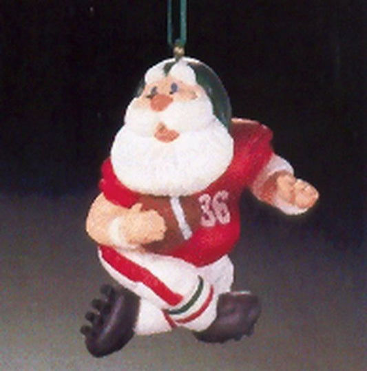 Aunt Krismas 'Touchdown Santa' ornament by Peter Dutkin. Year: 1986 - N/A series #0. 'Mint In Box' condition.
