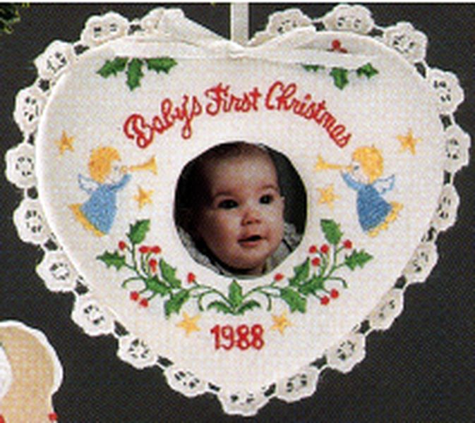 Aunt Krismas 'Baby's First Christmas - Photo Holder' ornament by Hallmark. Year: 1988 - N/A series #0. 'Slightly Damaged Box' condition.