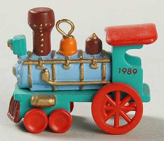 Aunt Krismas 'Blue Locomotive' ornament by Linda Sickman. Year: 1989 - Noel R.R. series #1. 'Mint In Box' condition.