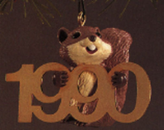 Aunt Krismas 'Squirrel with Brass 1990' ornament by Ed Seale. Year: 1990 - Fabulous Decade series #1. 'Mint In Box' condition.