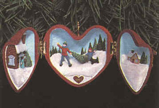Aunt Krismas 'Bringing Home the Tree' ornament by Ed Seale. Year: 1991 - Heart of Christmas series #2. 'Mint In Box' condition.