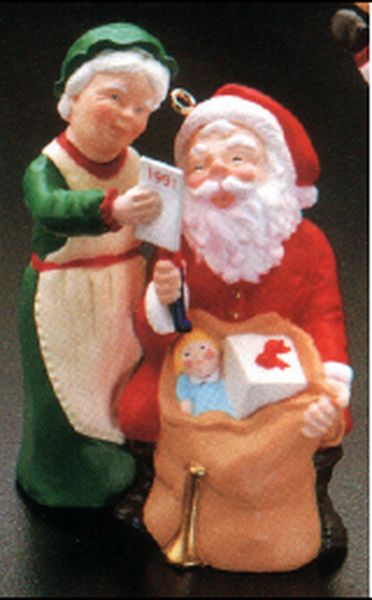 Aunt Krismas 'Checking His list' ornament by Duane Unruh. Year: 1991 - Mr. and Mrs. Claus series #6. 'Mint In Box' condition.