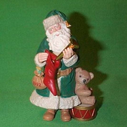 Aunt Krismas 'Filling the Stocking' ornament by Duane Unruh. Year: 1992 - Merry Olde Santa series #3. 'Mint In Box' condition.