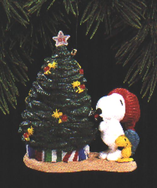 Aunt Krismas 'Snoopy and Woodstock Decorate the Tree' ornament by Dill Rhodus. Year: 1993 - Peanuts series #3. 'Mint In Box' condition.