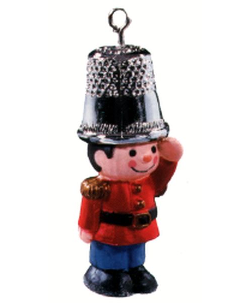 Aunt Krismas 'A Chistmas Salute' ornament by Sue Tague. Year: 1979 - Thimble series #2. 'No Box' condition.