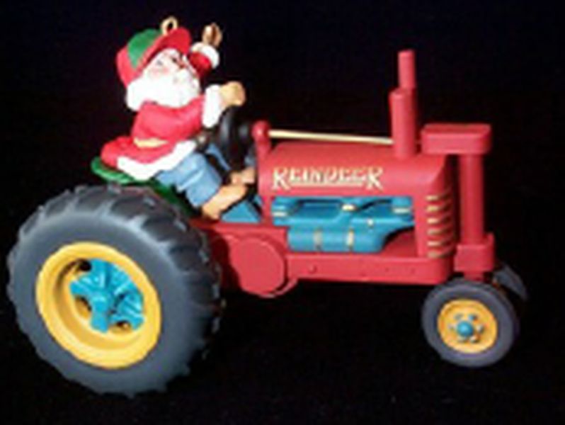Aunt Krismas 'Makin’ Tractor Tracks' ornament by Linda Sickman. Year: 1994 - Here Comes Santa series #16. 'Mint In Box' condition.