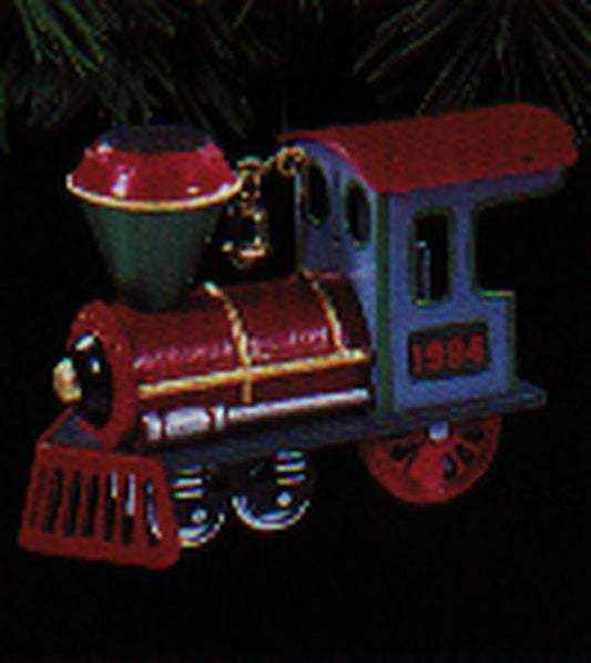 Aunt Krismas 'Locomotive' ornament by Linda Sickman. Year: 1994 - Yuletide Central series #1. 'Mint In Box' condition.