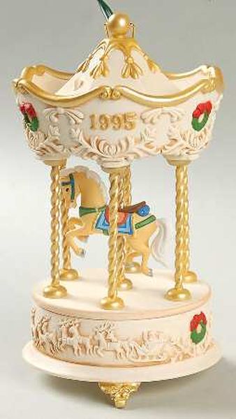 Aunt Krismas 'Over the Waves' ornament by Tobin Fraley. Year: 1995 - Tobin Fraley Holiday Carousel series #2. 'Mint In Box' condition.
