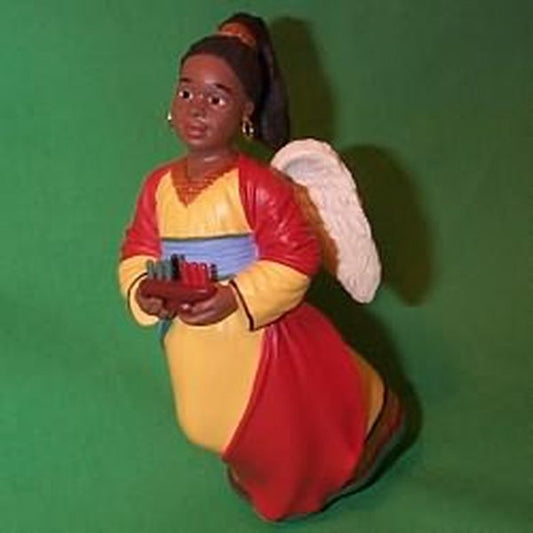 Aunt Krismas 'Red and Yellow Robe' ornament by Patricia Andrews. Year: 1996 - A Celebration of Angels series #2. 'No Box' condition.