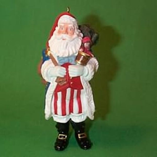Aunt Krismas 'Fourth of July ' ornament by Ken Crow. Year: 1996 - Merry Olde Santa series #7. 'Mint In Box' condition.
