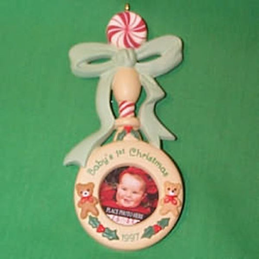 Aunt Krismas 'Baby's First Christmas - Photo Holder' ornament by Hallmark. Year: 1997 - N/A series #0. 'No Box' condition.