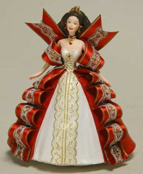Aunt Krismas 'Red Dress with Bows' ornament by Patricia Andrews. Year: 1997 - Holiday Barbie series #5. 'Mint In Box' condition.