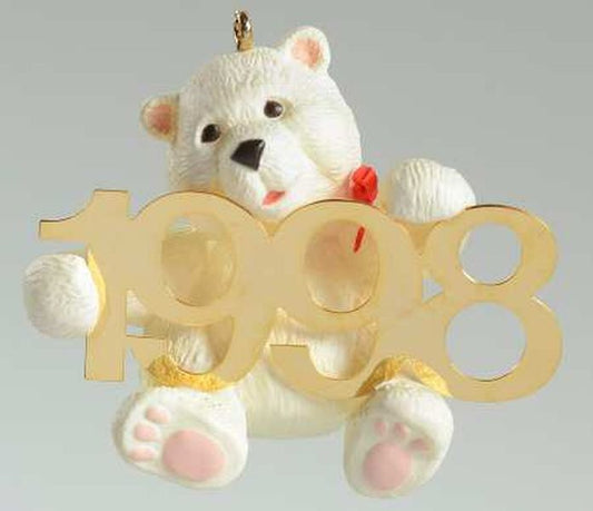 Aunt Krismas 'Polar Bear with Brass 1998' ornament by Sharon Pike. Year: 1998 - Fabulous Decade series #9. 'Mint In Box' condition.