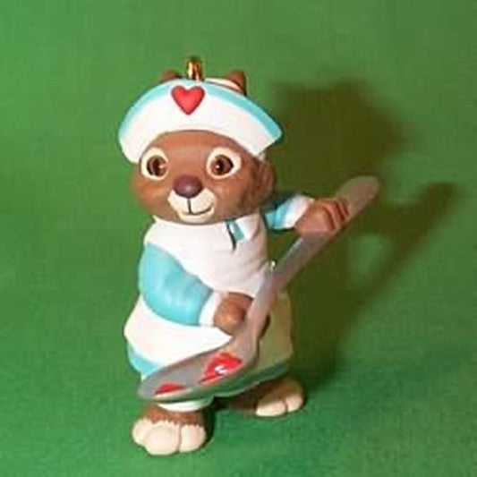 Aunt Krismas 'Spoonful of Love' ornament by Sue Tague. Year: 1998 - Nurse  series #0. 'No Box' condition.