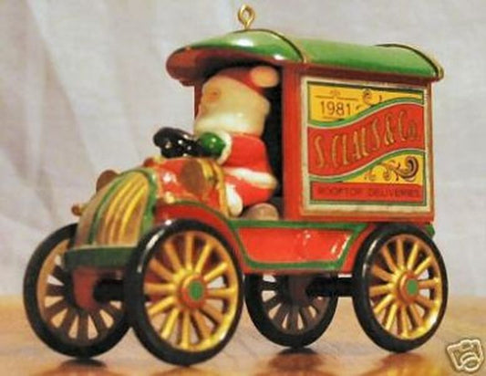 Aunt Krismas 'Rooftop Deliveries' ornament by Jim Mahon. Year: 1981 - Here Comes Santa series #3. 'Slightly Damaged Box' condition.