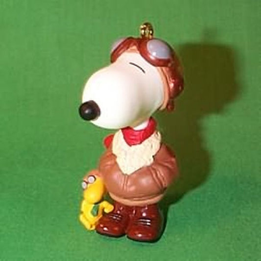 Aunt Krismas 'Famous Flying Ace' ornament by Bob Siedler. Year: 1999 - Spotlight on Snoopy series #2. 'Mint In Box' condition.