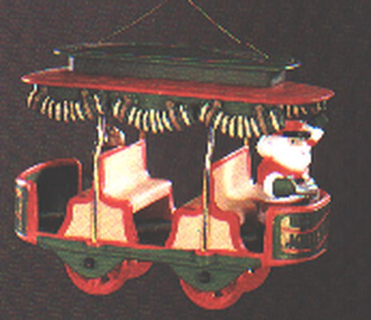 Aunt Krismas 'Jolly Trolley' ornament by Linda Sickman. Year: 1982 - Here Comes Santa series #4. 'Mint In Box' condition.