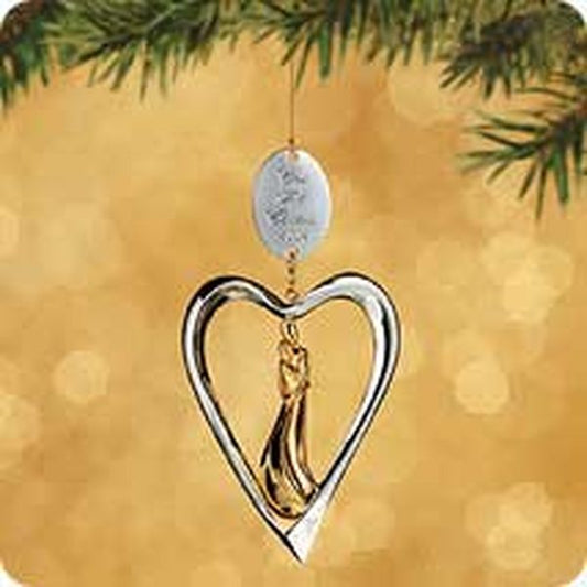 Aunt Krismas 'Our First Christmas (Silver Heart)' ornament by Patricia Andrews. Year: 2002 - N/A series #0. 'Mint In Box' condition.