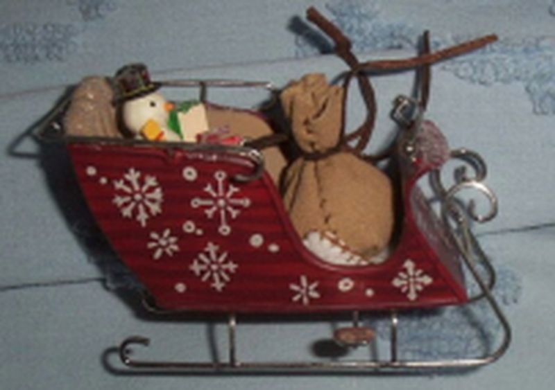 Aunt Krismas 'Santa's Magic Sleigh' ornament by Chris Webb. Year: 2003 - N/A series #0. 'Mint In Box' condition.