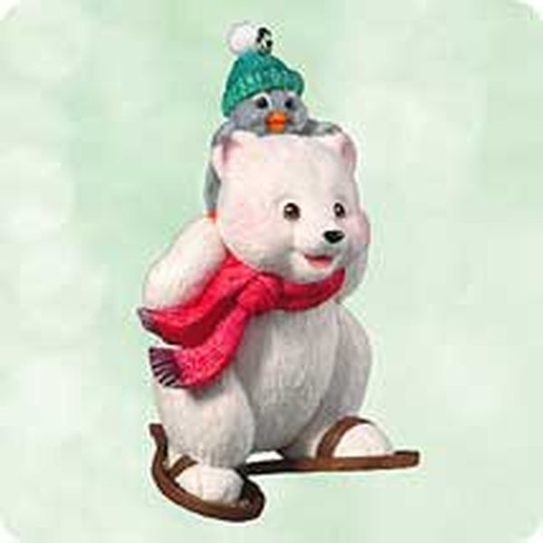 Aunt Krismas 'Snowshoe Taxi' ornament by Joanne Eschrich. Year: 2003 - Snowball and Tuxedo series #3. 'Mint In Box' condition.