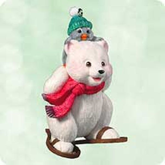 Aunt Krismas 'Snowshoe Taxi' ornament by Joanne Eschrich. Year: 2003 - Snowball and Tuxedo series #3. 'Mint In Box' condition.