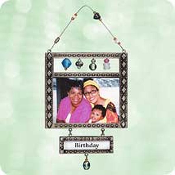 Aunt Krismas 'Special Event - Photo Holder' ornament by Hallmark. Year: 2003 - N/A series #0. 'Mint In Box' condition.