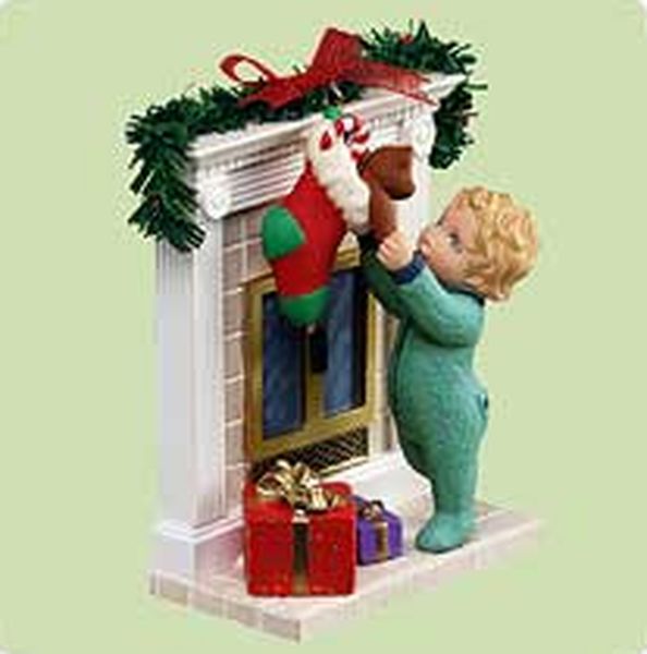 Aunt Krismas 'Reaching for Christmas' ornament by Tammy Haddix. Year: 2004 - N/A series #0. 'Mint In Box' condition.