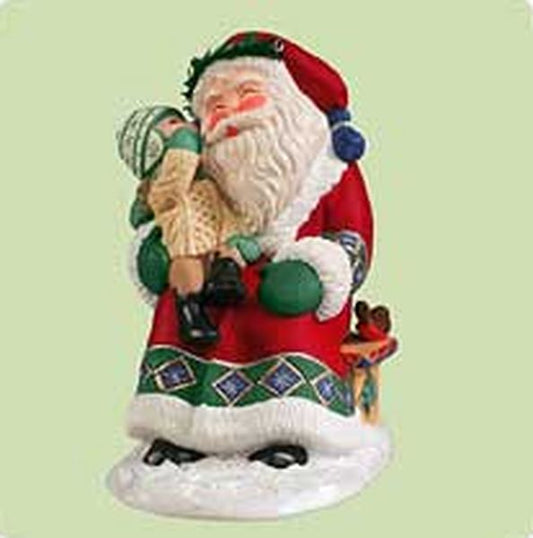 Aunt Krismas 'Sittin' on Santa's Lap' ornament by Tammy Haddix. Year: 2004 - N/A series #0. 'Mint In Box' condition.