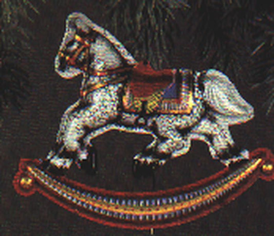 Aunt Krismas 'Tin Rocking Horse' ornament by Linda Sickman. Year: 1983 - N/A series #0. 'Slightly Damaged Box' condition.