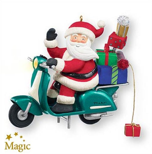 Aunt Krismas 'Santa's Scooter' ornament by Sharon Visker. Year: 2007 - N/A series #0. 'Mint In Box' condition.