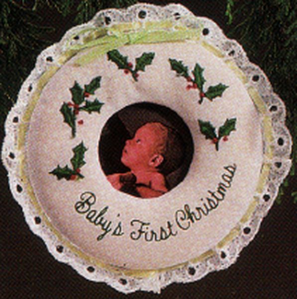 Aunt Krismas 'Baby's First Christmas - Photo Holder' ornament by Hallmark. Year: 1984 - N/A series #0. 'Mint In Box' condition.